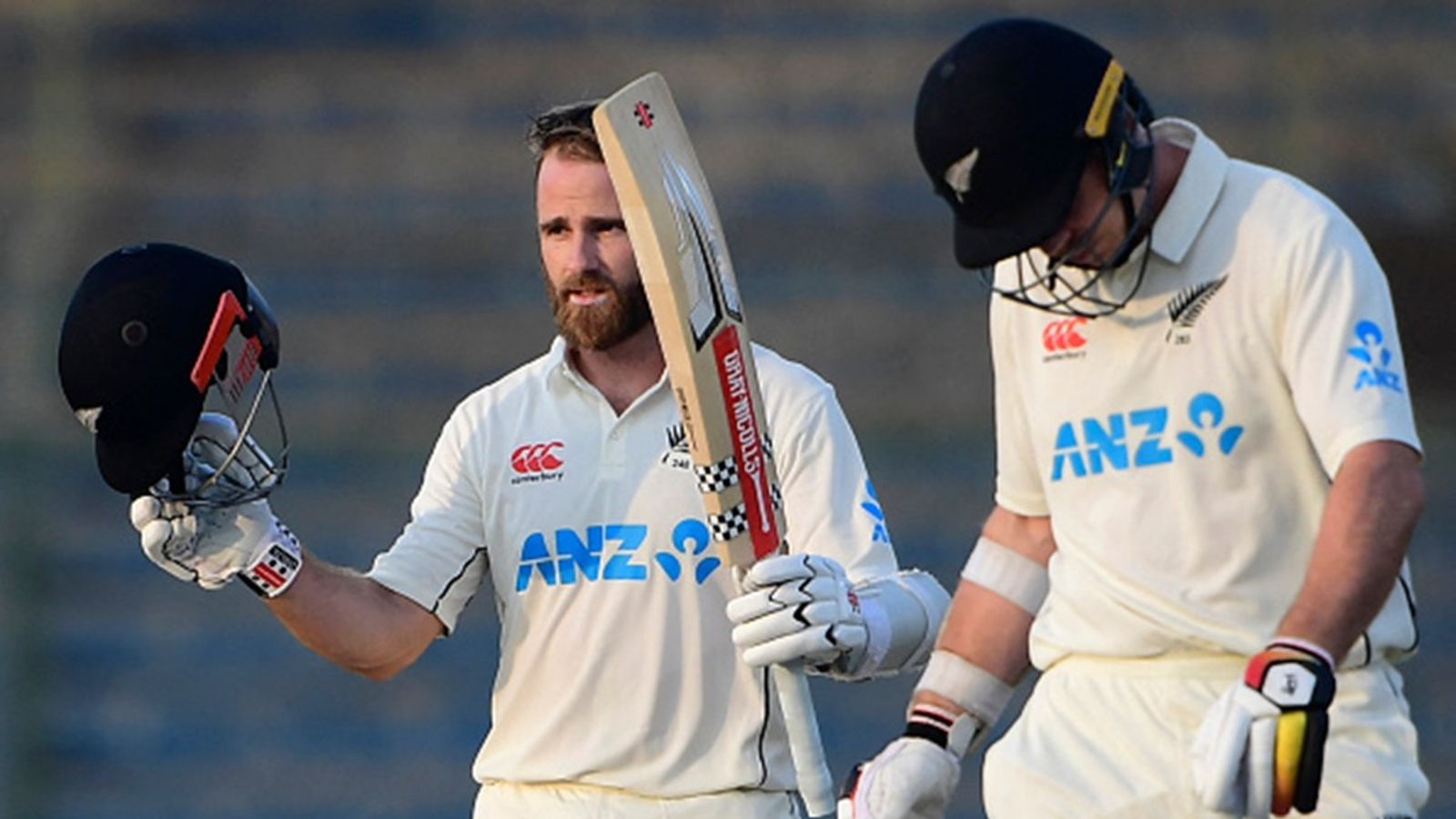 New Zealand announce Test squad for Zimbabwe tour, Kane Williamson & Michael Bracewell unavailable but star spinner makes comeback New Zealand's Kane Williamson (L) celebrates after scoring a century (100 runs) as his teammate Michael Bracewell watches during the third day of the first Test against Pakistan at the National stadium in Karachi on December 28, 2022.