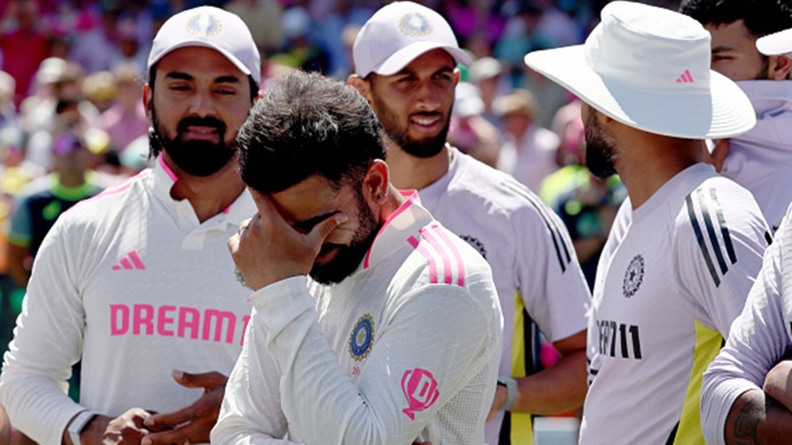 'You know it's time when you are colouring your beard every four days': Virat Kohli opens up on Test retirement amidst India's England tour India's Virat Kohli (2nd L) reacts with teammates during the trophy ceremony after the fifth Test against Australia at The SCG in Sydney on January 5, 2025.