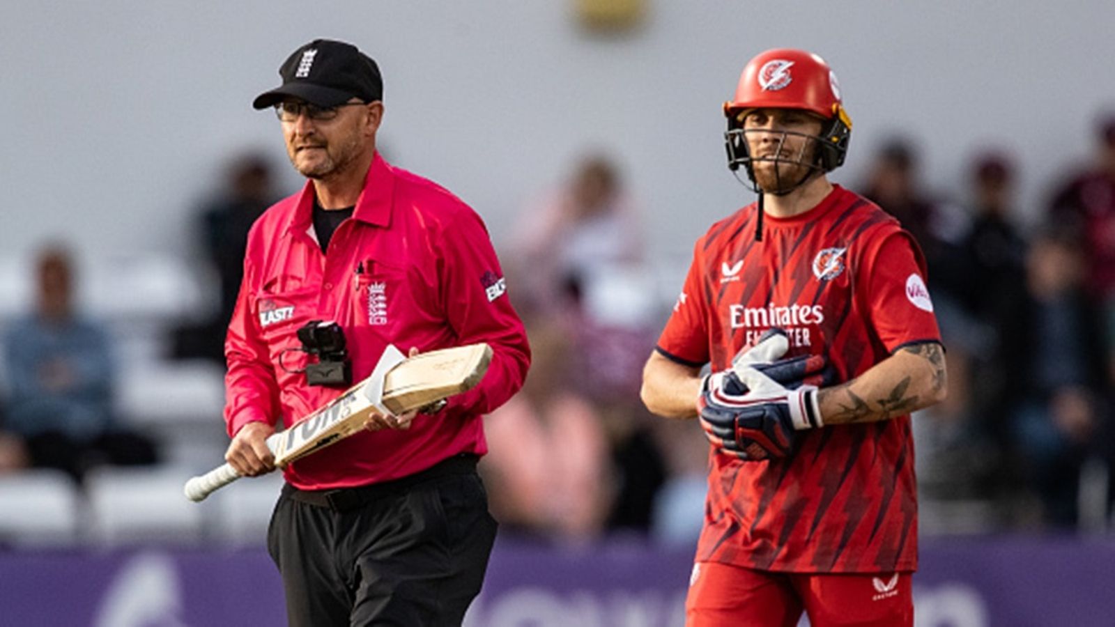 Phil Salt's bat used in T20 World Cup, Champions Trophy, IPL cleared by ECB's Anti-Corruption Unit; Lancashire slam commentators, media for inappropriate comments Umpire Simon Widdup applies a size gauge to the bat of Phil Salt of Lancashire Lightning during the Men's T20 Blast match against Northamptonshire Steelbacks at The County Ground on July 04, 2025 in Northampton, England.