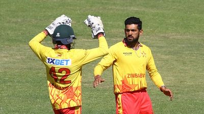 Sikandar Raza to lead as Zimbabwe announces squad for T20I tri-series with South Africa, New Zealand Zimbabwe's Sikandar Raza (R) celebrates with wicket keeper Clive Madande (L) after taking a wicket during the fifth T20 international cricket