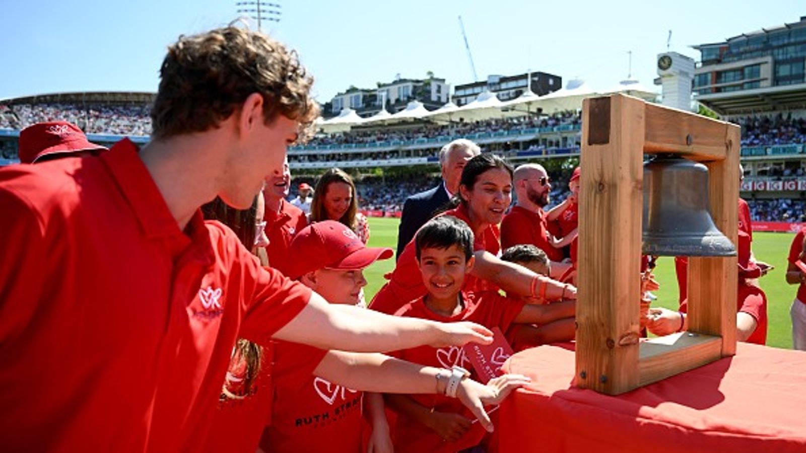 Revealed! Why are spectators wearing red on Day 2 of Lord's Test between India and England : The five minute bell is rang ahead of a day two of 3rd Rothesay Test Match between England and India at Lord's Cricket Ground on July 11, 2025 in London, England.