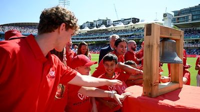 Revealed! Why are spectators wearing red on Day 2 of Lord's Test between India and England : The five minute bell is rang ahead of a day two of 3rd Rothesay Test Match between England and India at Lord's Cricket Ground on July 11, 2025 in London, England.