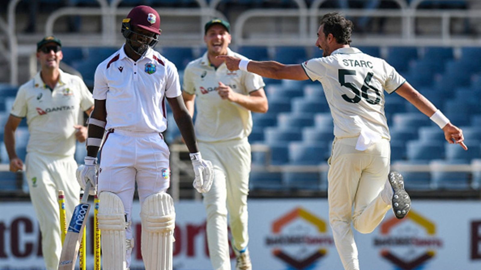West Indies 27 all out! Mitchell Starc's fastest fifer, Scott Boland's hat-trick leads Australia to 176-run win, complete 3-0 whitewash Jayden Seales (L) of West Indies reacts after being bowled by Mitchell Starc (R) of Australia during the third day of the third Test at Sabina Park in Kingston, Jamaica, on July 14, 2025.