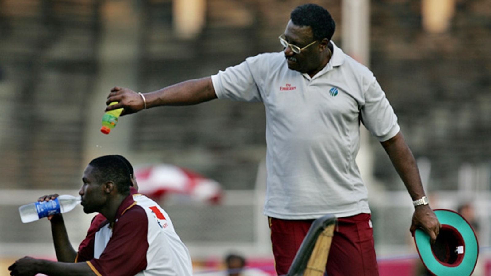 West Indies' 2-time World Cup-winning captain reacts to 27 all out against Australia, says 'There is nothing wrong with...' Ex-West Indies Captain Clive Lloyd sprays water on Wavell Hinds during their practice session at CCI, Mumbai.