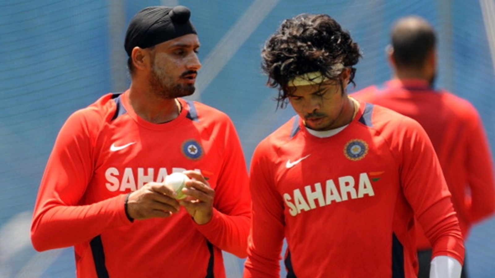 'I don't want to talk to you. You hit my father': Harbhajan Singh reveals he got emotional when Sreesanth's daughter shunned him Indian bowler Harbhajan Singh (L) talks with teammate S. Sreesanth during a training session at The Wankhede Stadium in Mumbai on April 1, 2011, on the eve of the final match.