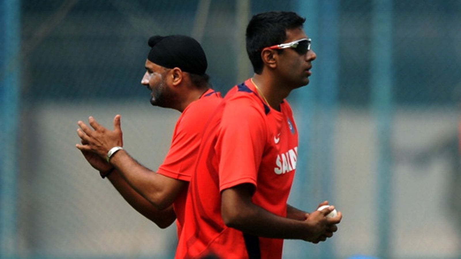 'Some people think I retired because Washington Sundar is in scheme of things now': R Ashwin's answer to Harbhajan Singh's 'Do you think I'm jealous of you?' Indian cricketers Harbhajan Singh (L) and Ravichandran Ashwin prepare to bowl in the nets during a training session at The National Cricket Academy (NCA) in Bangalore on February 25, 2011.