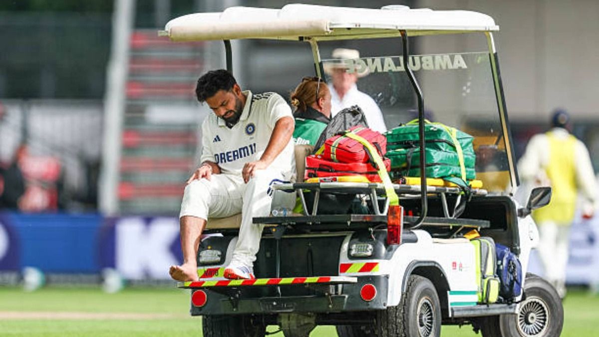 Rishabh Pant of India leaves the field after injuring his right leg during Day 1 of the Fourth Rothesay Test match between England and India at Old Trafford