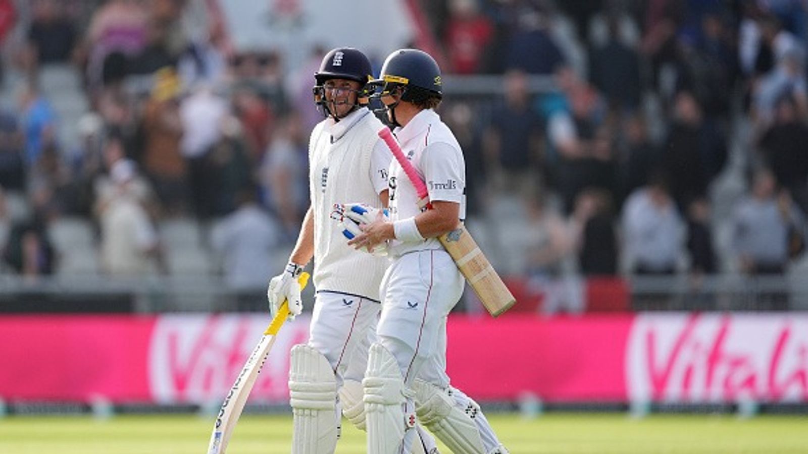 IND vs ENG: Ben Stokes' fifer and openers' fifites help England close Day 2 on top, India eye comeback In Manchester Test England's Joe Root (left) and Ollie Pope leave the field at the end of play on day two of the Fourth Rothesay Men's Test at the Emirates Old Trafford, Manchester. Picture date: Thursday July 24, 2025.