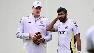 'The other guys need to help him out and...': Morne Morkel's massive revelation on Jasprit Bumrah's bowling struggle in Manchester Test India's Jasprit Bumrah (R) chats with bowling coach Morne Morkel during a practice session ahead of the fifth cricket Test match between Australia and India at the Sydney Cricket Ground in Sydney on January 2, 2025.
