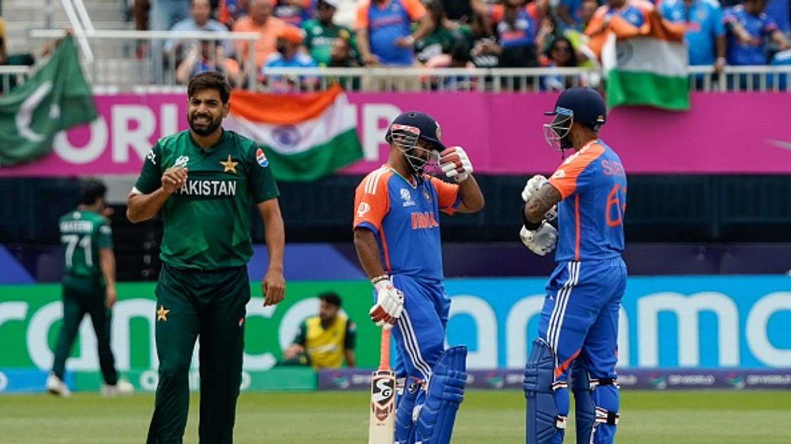 'Indian players boycotted WCL..but now Asia Cup vs Pakistan...': Ex-cricketer alleges BCCI for 'using patriotism when it suits' after Asia Cup 2025 schedule Pakistan's Haris Rauf looks on as India's Rishabh Pant talks with teammate Suryakumar Yadav after Pant hit four during the ICC men's Twenty20 World Cup 2024 group A cricket match