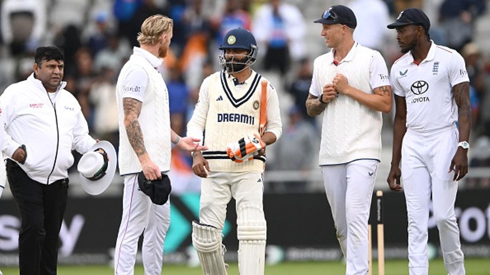 'You weren't able to bowl out India, had...': Ex-RCB star blasts Ben Stokes after handshake row in Manchester Test England captain Ben Stokes speaks with India batsman Ravindra Jadeja after day five of the 4th Test Match between England and India at Emirates Old Trafford on July 27, 2025 in Manchester, England