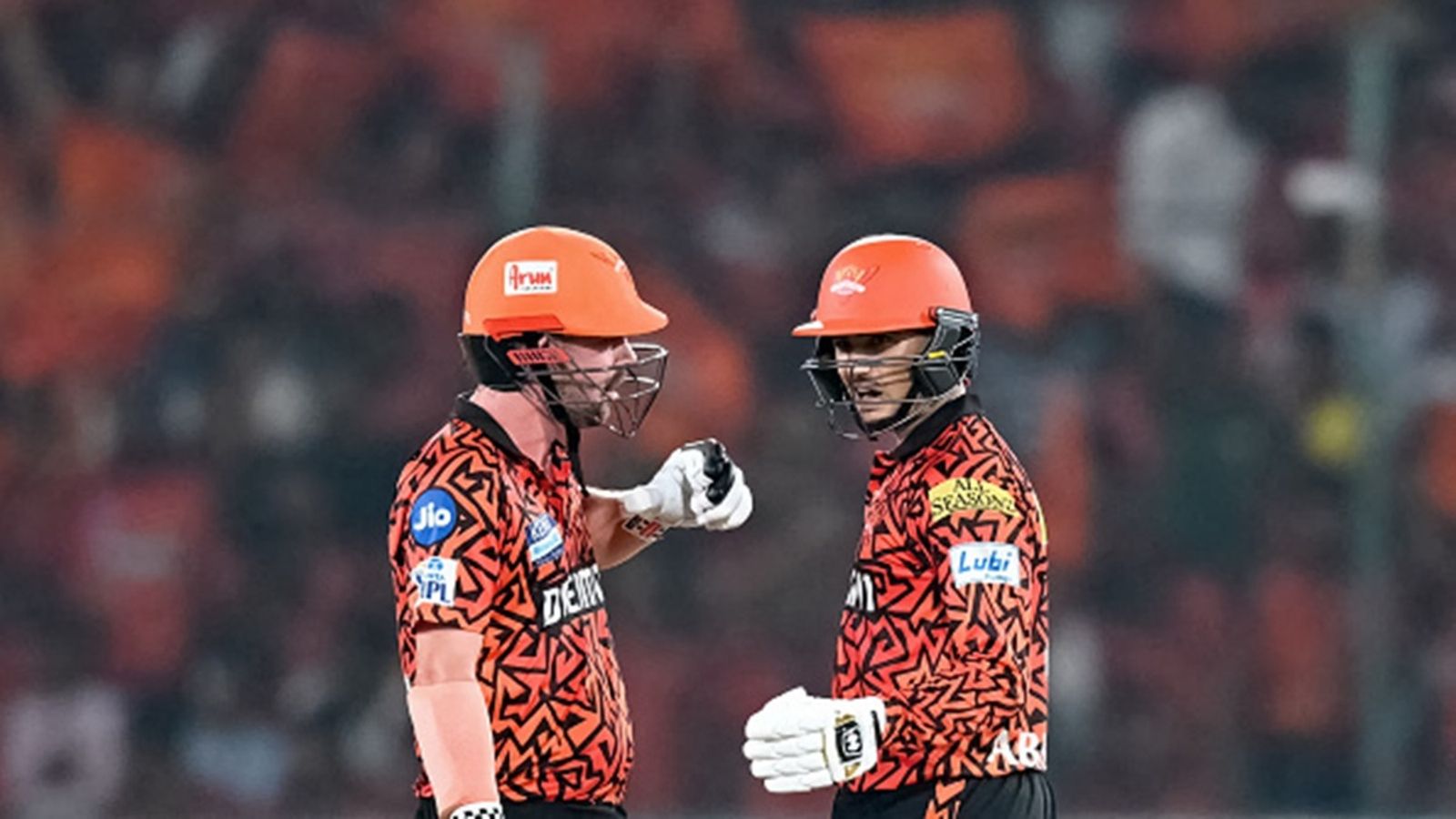ICC punishes Travis Head for missing West Indies series, SRH teammate Abhishek Sharma becomes 3rd Indian to be crowned no.1 T20I batter Sunrisers Hyderabad's Abhishek Sharma (R) and Travis Head speak during the Indian Premier League (IPL) match against Punjab Kings at the Rajiv Gandhi International Stadium in Hyderabad on April 12, 2025.