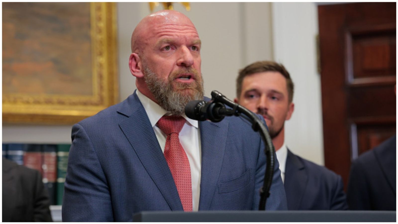 WATCH: WWE legend Triple H does the legendary water spit at the White House Triple H in the frame.