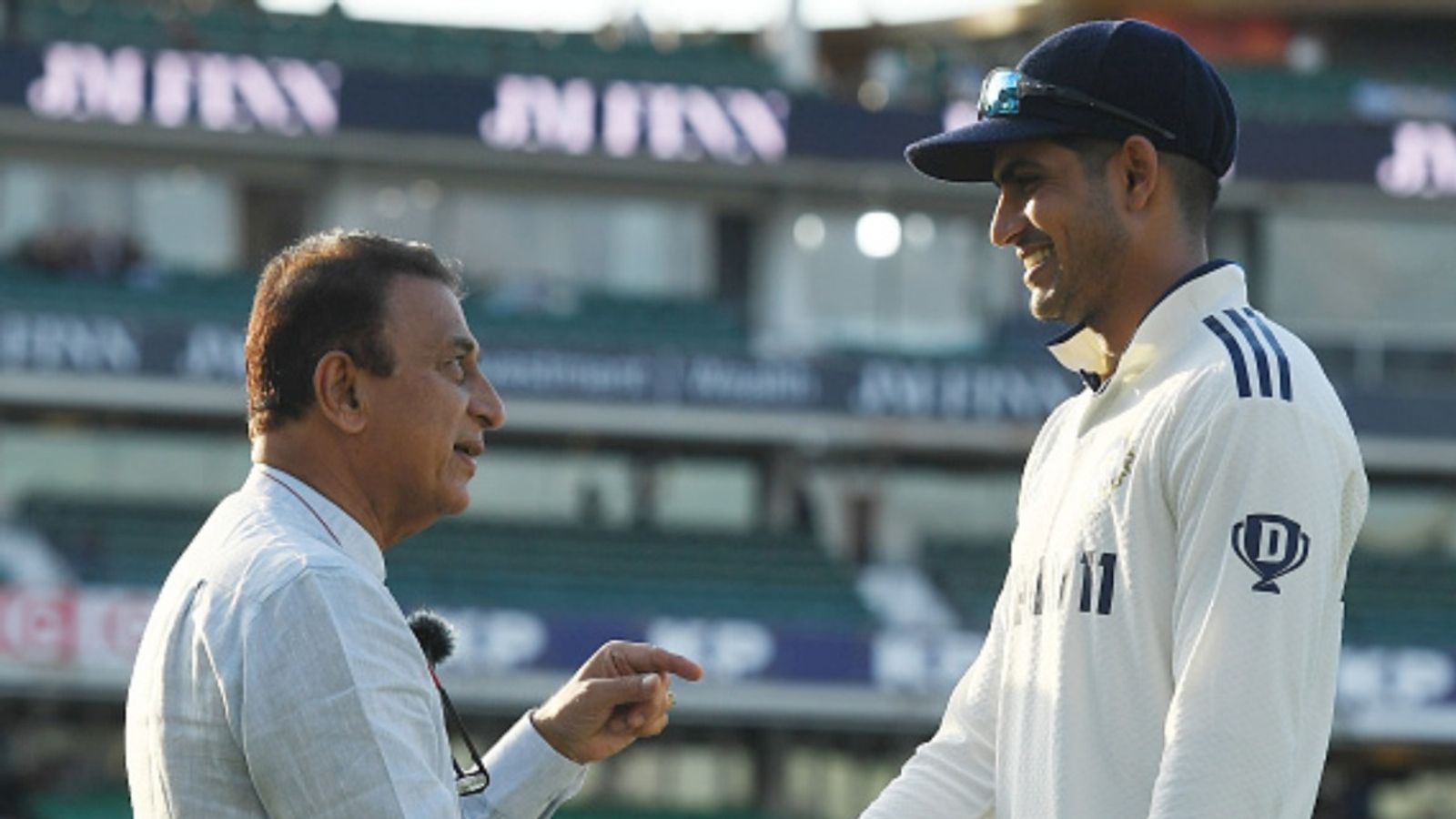 'This is a little cap, which I give to very few people with my signature': Sunil Gavaskar's special gift to Shubman Gill for coming close to his record Sunil Gavaskar (L) talks to Shubman Gill of India after the third day of the fifth Test at The Kia Oval on August 2, 2025 in London, England.