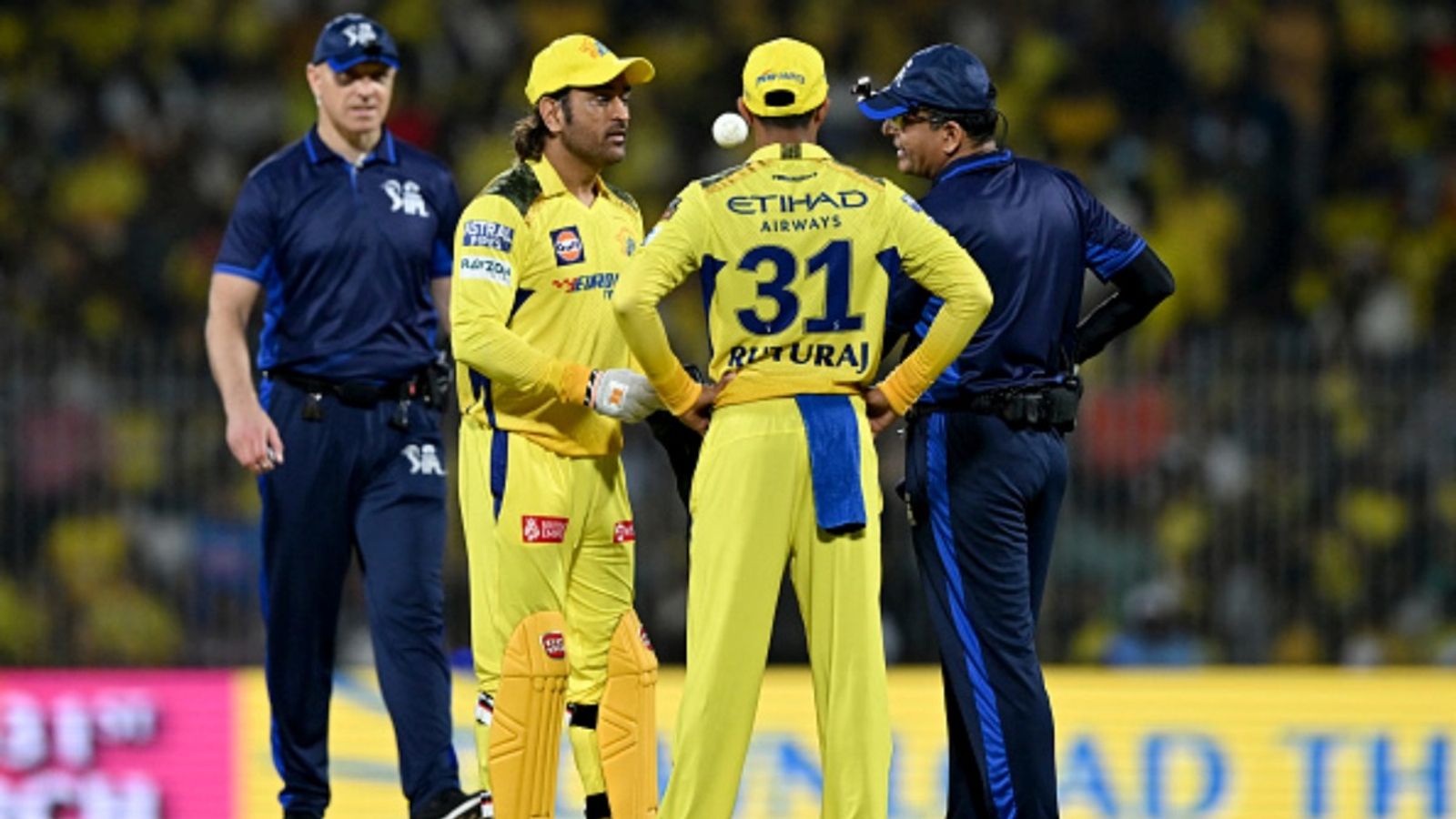 'A small auction is coming in December. Some loopholes are...': MS Dhoni's message to CSK fans after finishing 10th in IPL 2025 Chennai Super Kings' MS Dhoni (2L) and captain Ruturaj Gaikwad (2R) inspect the ball during the Indian Premier League (IPL) match against Gujarat Titans at the MA Chidambaram Stadium in Chennai on March 26, 2024.