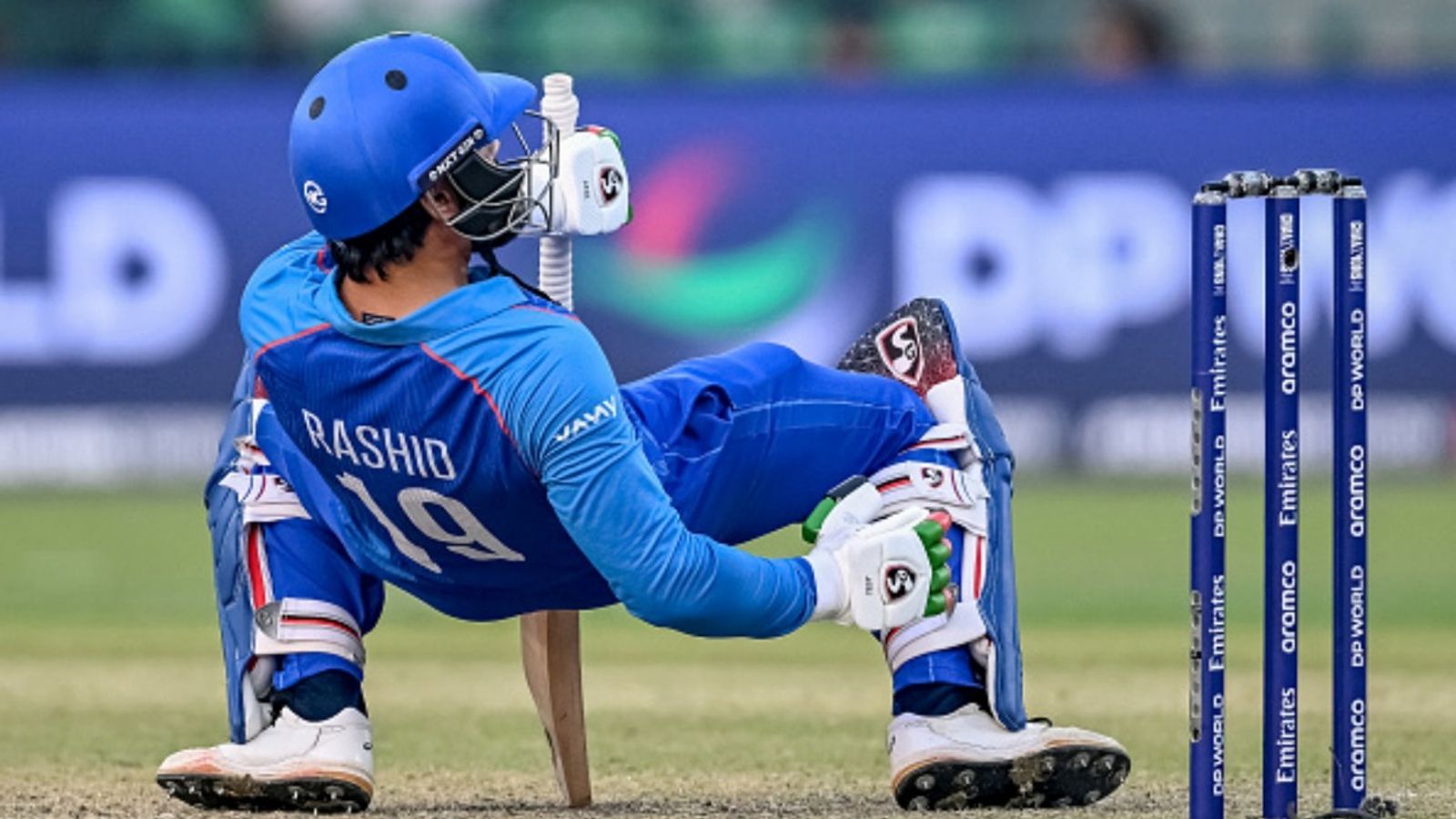 ACB announces Afghanistan's 22-member preliminary squad for T20 Asia Cup 2025, continue to back Rashid Khan as captain Afghanistan's Rashid Khan falls after playing a shot during the ICC Champions Trophy ODI match against Australia at the Gaddafi Stadium in Lahore on February 28, 2025.