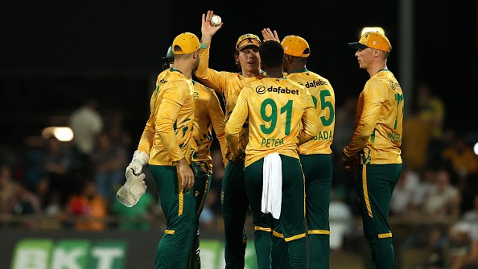 AUS vs SA: Dewald Brevis’ unbeaten century and South Africa’s ruthless bowling display secure commanding 53-run win over Australia in 2nd T20I Dewald Brevis of South Africa celebrates with teammates after taking a catch to dismiss Alex Carey of Australia off the bowling of Nqaba Peter of South Africa during game two in the T20 International series between Australia and South Africa
