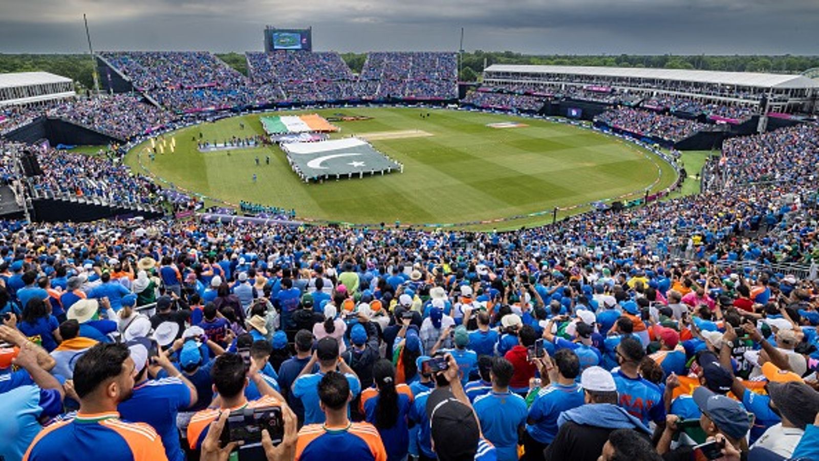 Asia Cup 2025: All you need to know about the tournament structure, participating teams, and venues East Meadow, N.Y.: Flags representing India and Pakistan on the field at the ICC Men's T20 World Cup, 2024 - Match 19 INDIA vs PAKISTAN in Nassau County International Cricket Stadium