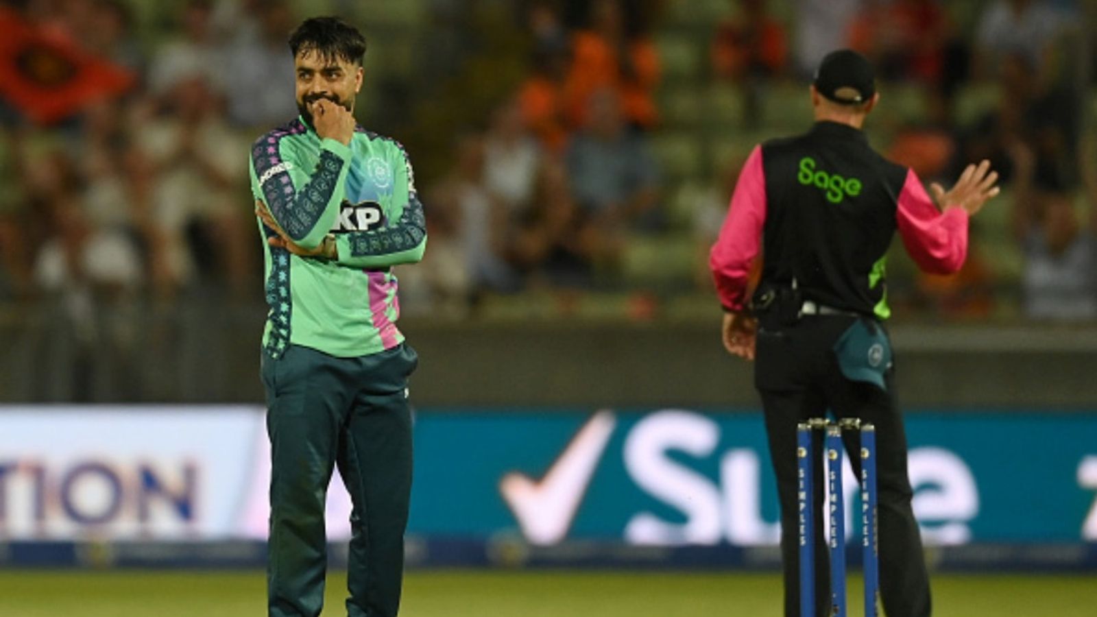 Rashid Khan gets a reality check ahead of T20 Asia Cup from RCB batter as he concedes 59 runs in The Hundred 2025 clash, most expensive spell in league's history Rashid Khan of Oval Invincibles reacts during the The Hundred match between Birmingham Phoenix Men and Oval Invincibles Men at Edgbaston on August 12, 2025 in Birmingham, England.