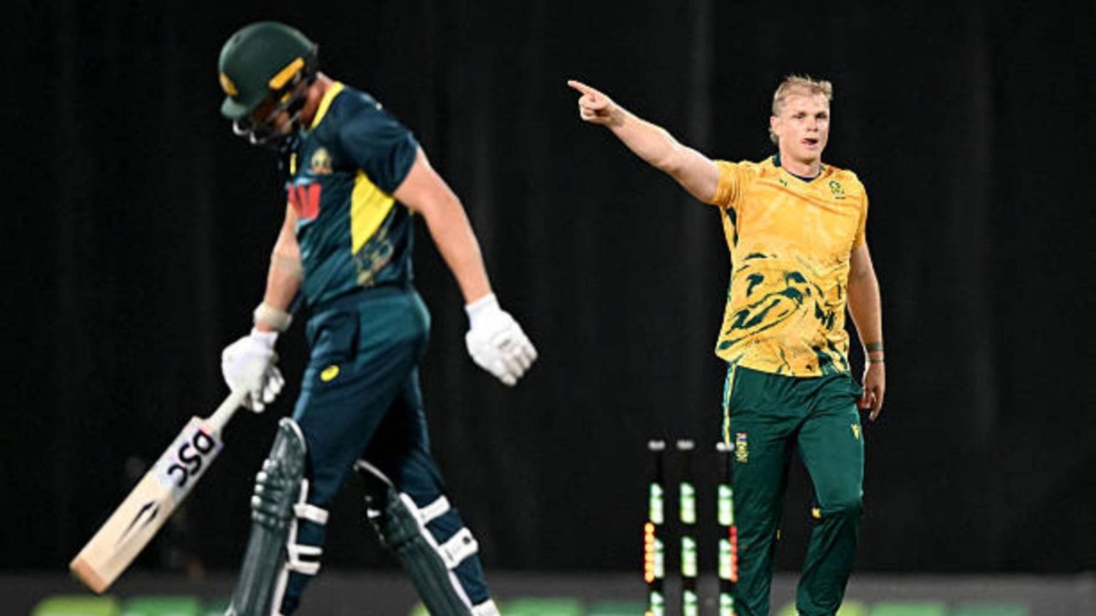 ICC punishes Corbin Bosch for giving fiery send-off to Ben Dwarshuis in 2nd Australia-South Africa T20I South Africa's Corbin Bosch (R) celebrates after taking the wicket of Australia's Ben Dwarshuis (L) during the second Twenty20 international cricket match between Australia and South Africa in Darwin