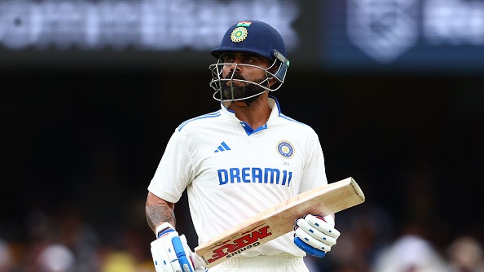 'Virat's aggression, people say, is a lot, I would say if...': Kohli's World Cup-winning teammate's blunt take on his playing style Virat Kohli of India looks dejected after being dismissed by Josh Hazlewood of Australia during day three of the Third Test match in the series between Australia and India at The Gabba on December 16, 2024 in Brisbane, Australia.