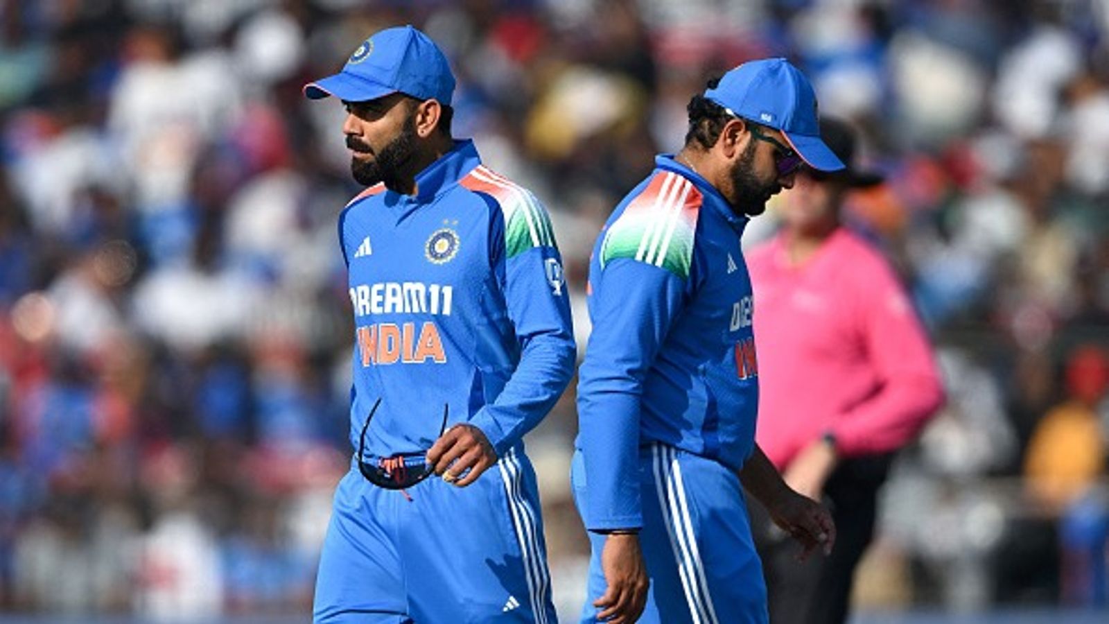 'Virat Kohli is very fit, and Rohit Sharma plays very well': Rajeev Shukla breaks silence on India batting great duo's farewell series talks India's captain Rohit Sharma (R) and his teammate Virat Kohli walk past each other during the second one-day international (ODI) cricket match between India and England