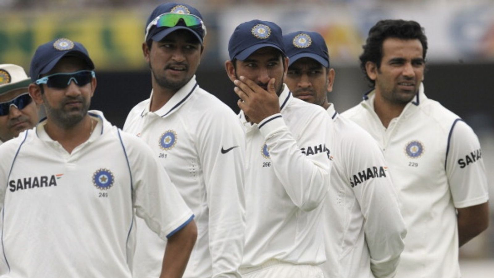 'He stood tall when the storm raged...': Head coach Gautam Gambhir to Yuvraj Singh, reactions to Cheteshwar Pujara's retirement Gautam Gambhir, Pragyan Ojha, Cheteshwar Pujara, captain MS Dhoni and Zaheer Khan look on prior to the start of the fourth day of the first Test against New Zealand at the Rajiv Gandhi International cricket stadium in Hyderabad on August 26, 2012.