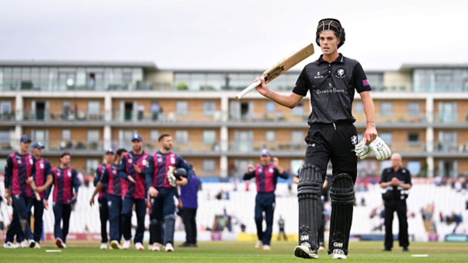 19-year-old son of Ashes-winning ex-England captain scores maiden List A century, fends off Yuzvendra Chahal in run chase to steer Somerset to 8-wicket win Archie Vaughan of Somerset leads his side off after scoring an unbeaten century following the Men's One Day Cup match against Northamptonshire at The Cooper Associates County Ground on August 26, 2025 in Taunton, England.