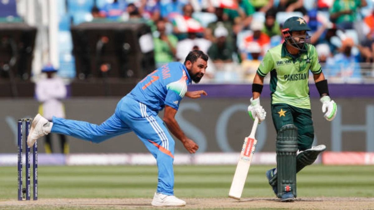 Mohammad Shami of India (L) and Muhammad Rizwan Caption of Pakistan look on during the ICC Champions Trophy 2025 match between Pakistan and India at Dubai International Cricket Stadium