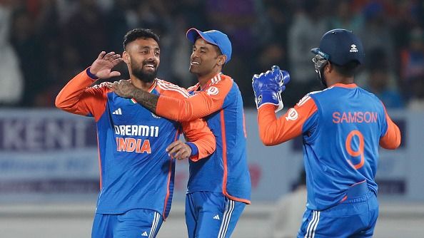 India's Varun Chakaravarthy (L) Suryakumar Yadav (C) and Sanju Samson in this frame