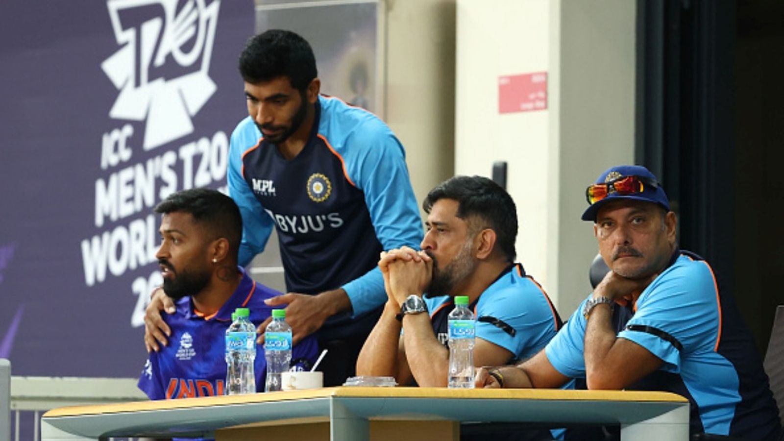 Will MS Dhoni be Team India’s mentor for T20 World Cup 2026? New update ends suspense Hardik Pandya, Jasprit Bumrah, MS Dhoni, Mentor of India and Ravi Shastri, Head Coach of India look on during the ICC Men's T20 World Cup match against Namibia at Dubai International Stadium on November 08, 2021.