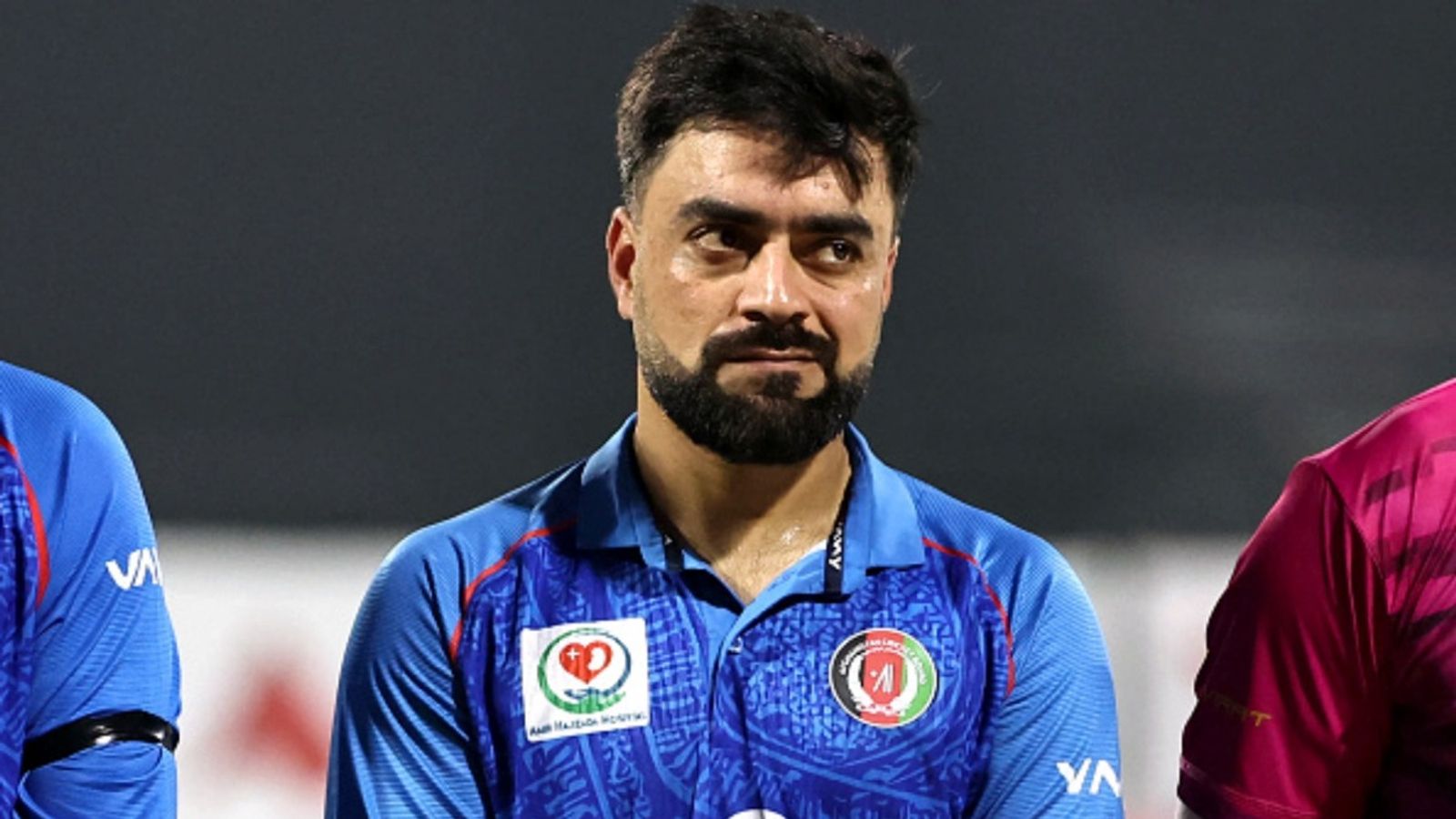 Rashid Khan breaks all-time T20I record with three-fer as Afghanistan hand UAE 38-run defeat despite captain's 6 sixes in blazing 67 Afghanistan's captain Rashid Khan stands with teammates as they observe a minute of silence for earthquake victims before the start of T20I match against the UAE in Sharjah on September 1, 2025.