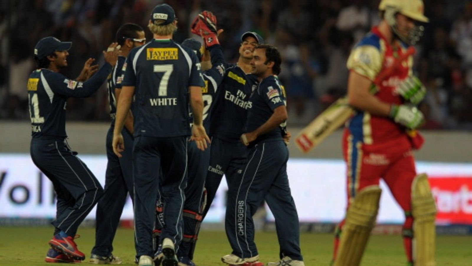 After R Ashwin, India spinner with 3 IPL hat-tricks announces retirement from all forms of cricket Deccan Chargers bowler Amit Mishra (2R) celebrates with teammates after taking the wicket of Royal Challengers Bengaluru batter AB De Villiers (R) during the IPL match at Rajiv Gandhi International Stadium in Hyderabad on May 20, 2012.