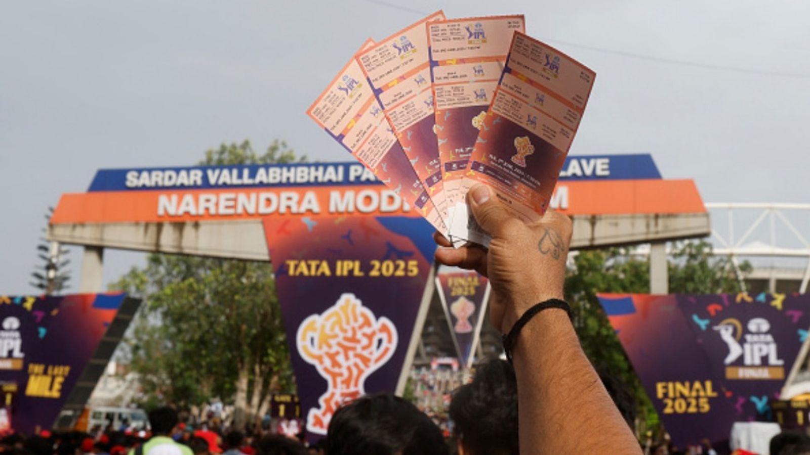 Explained: How GST's new rules have made your IPL tickets costlier but India games' prices remain unchanged A fan with tickets for the 2025 IPL Final match between Royal Challengers Bengaluru and Punjab Kings at Narendra Modi Stadium on June 03, 2025, in Ahmedabad, India.
