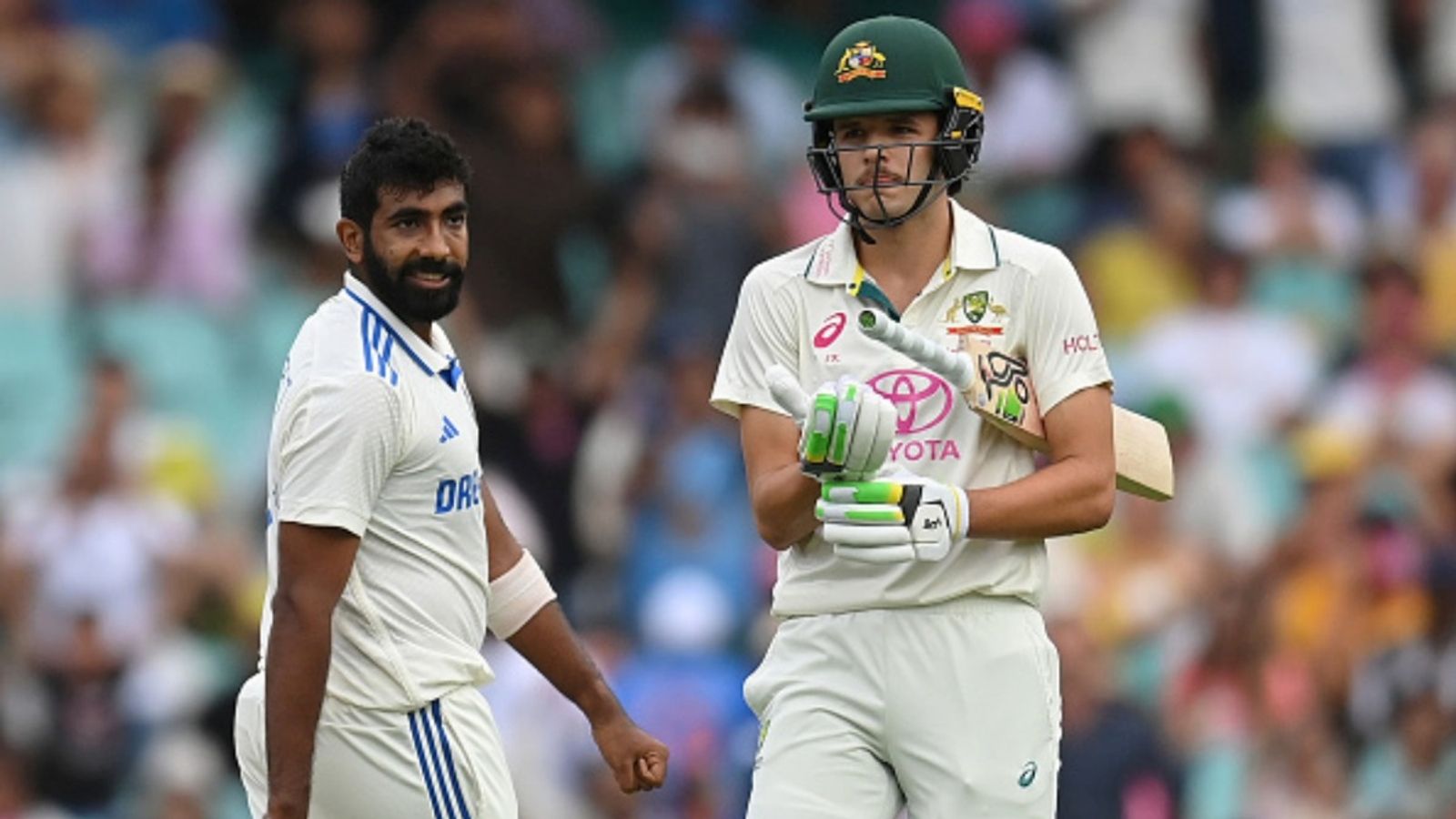 'I don't read comments on Instagram': Australia youngster Sam Konstas leaves social media, doesn't regret aggression against Jasprit Bumrah Jasprit Bumrah of India talks to Sam Konstas after dismissing Usman Khawaja with the last ball of day one of the fifth Test in the series at Sydney Cricket Ground on January 03, 2025.