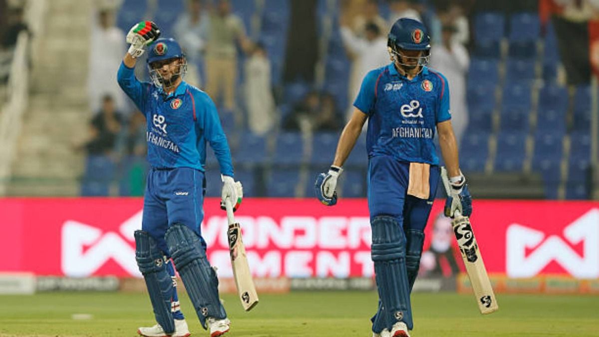 Azmatullah Omarzai of Afghanistan (L) celebrates after scoring fifty (50 runs) with Sediqullah Atal of Afghanistan during the match between Afghanistan and Hong Kong,China