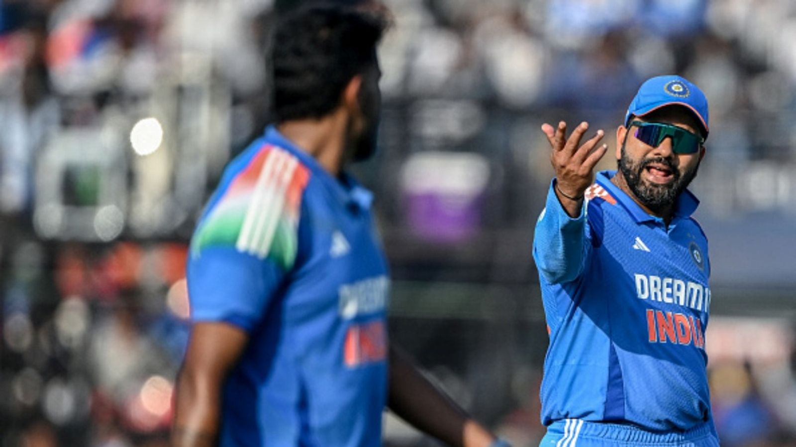 'Bhaiyaa, sar pe maaroon? He said...': Harshit Rana recalls conversation with Rohit Sharma to get Harry Brook out on ODI debut India's captain Rohit Sharma (R) speaks with teammate Harshit Rana.