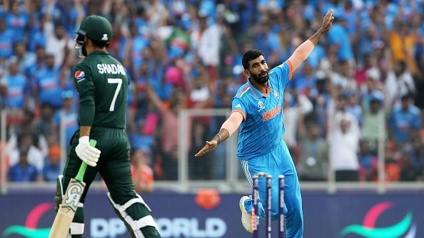 Jasprit Bumrah of India celebrates the wicket of Shadab Khan of Pakistan during the ICC Men's Cricket World Cup India 2023 between India and Pakistan