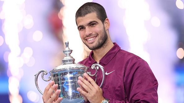 Carlos Alcaraz of Spain poses with his trophy after defeating Jannik Sinner of Italy during their Men's Singles Final match on Day Fifteen of the 2025 US Open at USTA Billie Jean King National Tennis Center on September 07, 2025 in New York City.