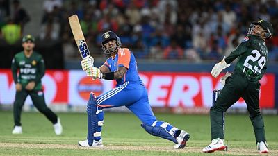 Rivalry, what rivalry? India’s supremacy over Pakistan continues, Suryakumar Yadav's brigade bulldoze Men in Green by 7 wickets to seal Asia Cup 2025 Super 4 berth India's captain Suryakumar Yadav (C) plays a shot during the Asia Cup 2025 Twenty20 international cricket match between India and Pakistan at the Dubai International Stadium in Dubai on September 14, 2025.