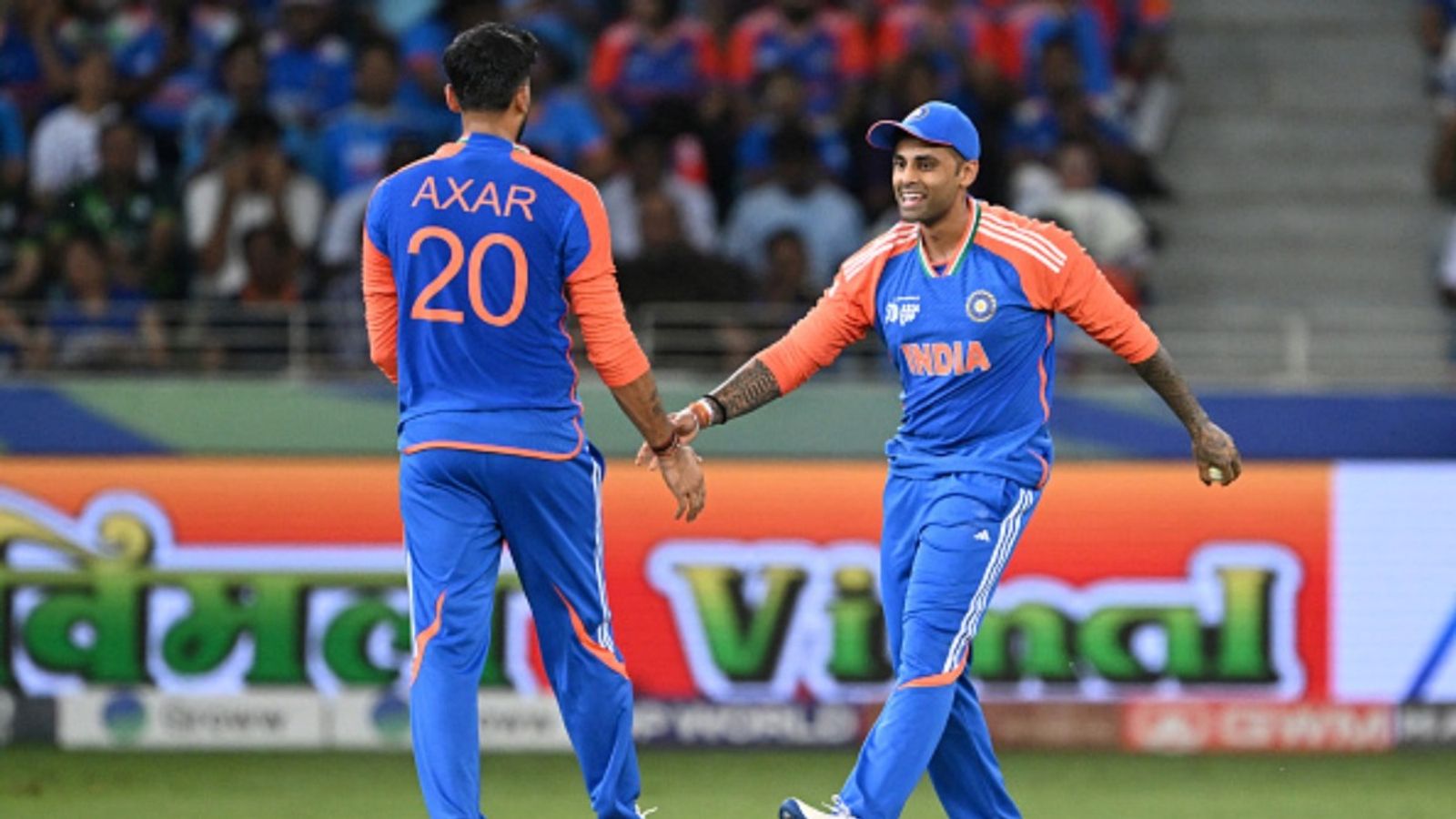 Team India get new jersey sponsor till 2027 World Cup, to pay BCCI Rs 50 lakh more per game than Dream11 India's Axar Patel (L) celebrates with captain Suryakumar Yadav (R) after taking the wicket of Pakistan's captain Salman Agha during the Asia Cup 2025 T20 match at the Dubai International Stadium in Dubai on September 14, 2025.