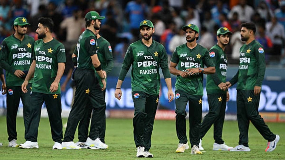 Pakistan's players walk back to the pavilion at the end of the Asia Cup 2025 Twenty20 international cricket match against India at the Dubai International Stadium in Dubai on September 14, 2025