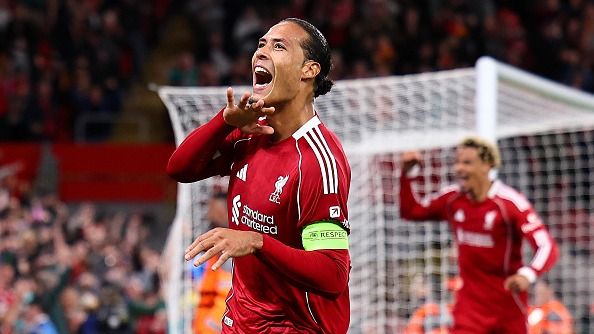 Virgil van Dijk of Liverpool scores a goal to make it 3-2 during the UEFA Champions League 2025/26 League Phase MD1 match between Liverpool FC and Atletico de Madrid at Anfield on September 17, 2025 in Liverpool, England.