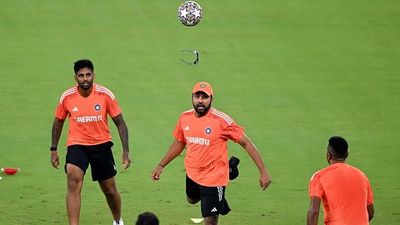 'I've become Rohit Sharma...': Suryakumar Yadav forgets India's playing XI during Asia Cup 2025 Group Stage clash against Oman, Watch VIDEO India's Rohit Sharma (C) and Suryakumar Yadav (L) attend a practice session