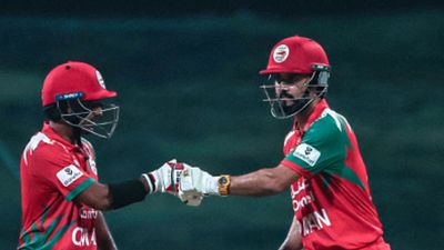 Oman creates history against India as Jatinder Singh and Aamir Kaleem stitched a 50-run stand to end their Asia Cup 2025 campaign Oman's captain Jatinder Singh (R) and his teammate Aamir Kaleem bump their fists during the Asia Cup 2025 Twenty20 international cricket match between India and Oman