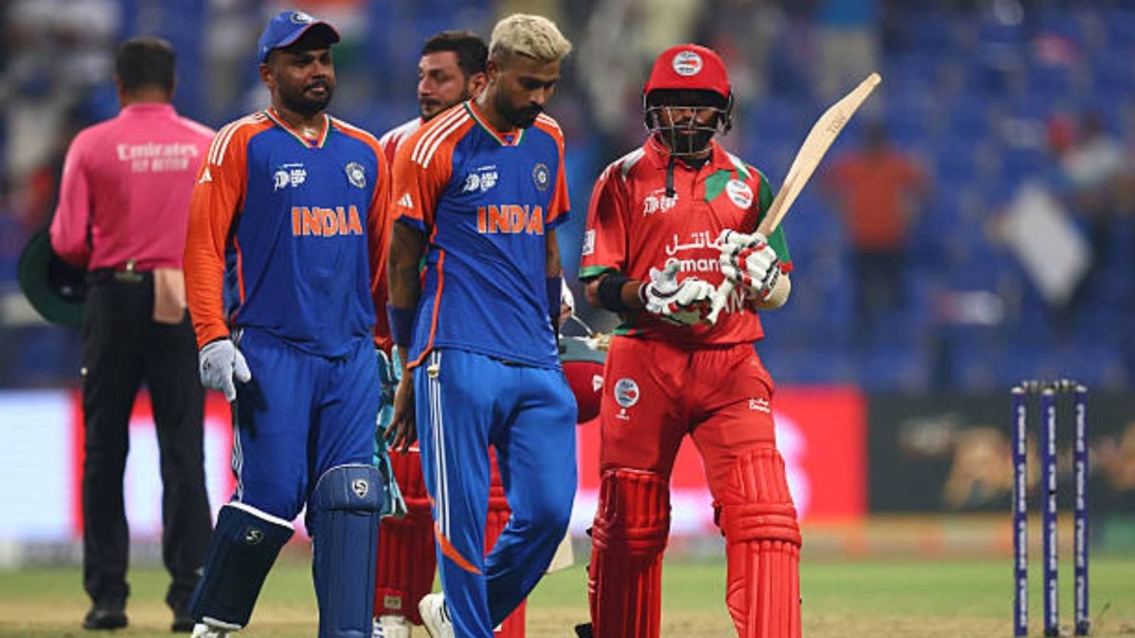 'If we can go to the NCA...': Oman captain Jatinder Singh makes desperate plea to BCCI after 21-run defeat to India in Asia Cup Vinayak Shukla (R) of Oman speaks to Hardik Pandya of India as they leave the field after the Asia Cup match between India and Oman