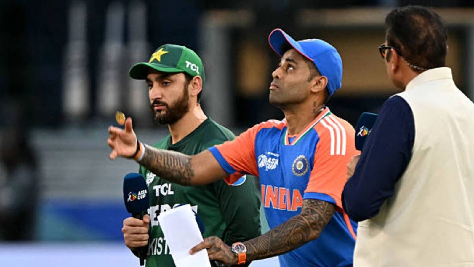 'Dont know what rivalry you are talking about...': Suryakumar Yadav's blunt take on upcoming Asia Cup clash against Pakistan India's captain Suryakumar Yadav (C) tosses the coin at the start of the Asia Cup 2025 Twenty20 international cricket match between India and Pakistan at the Dubai International Stadium in Dubai