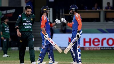From hype to hammering: Abhishek Sharma's hard-hitting 74 schools Pakistan as India notch thumping '6'-wicket win to kick off Super 4 campaign in style India's Abhishek Sharma and Tilak Varma bump fists during the Asia Cup 2025 Super Four Twenty20 international cricket match between India and Pakistan at the Dubai International Stadium in Dubai on September 21, 2025.