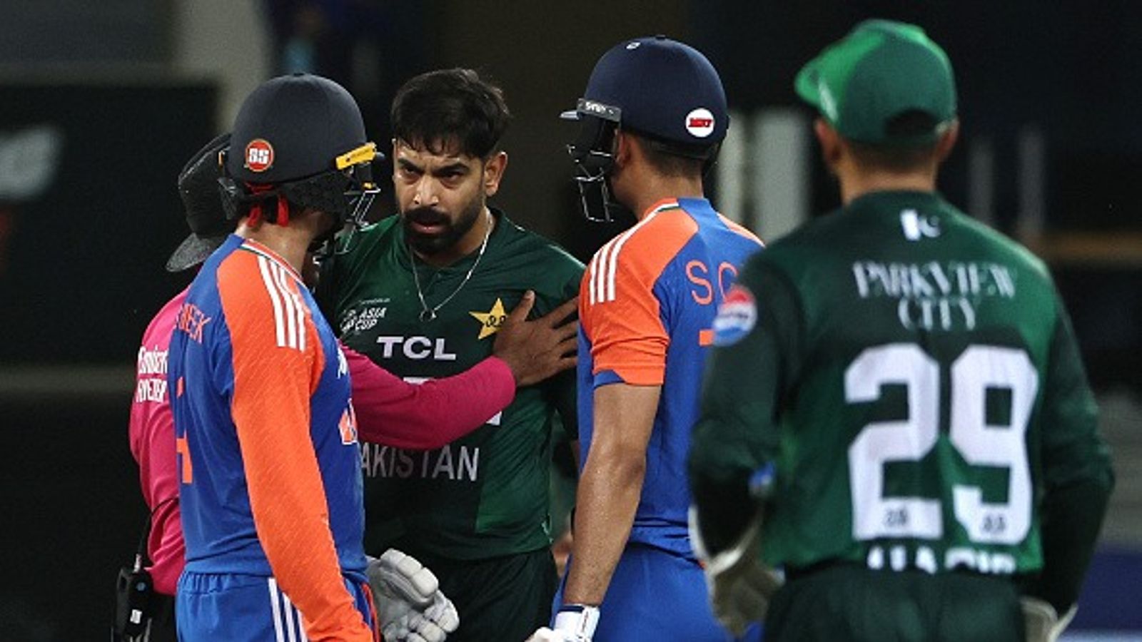 'Didn't like it..I could give medicine to...': Abhishek Sharma explains motivation behind his fierce knock against Pakistan in India's 6-wicket win in Asia Cup Super 4 tie Pakistan's Haris Rauf (3R) speaks with India's Abhishek Sharma (L) as Shubman Gill (2R) watches during the Asia Cup 2025 Super Four
