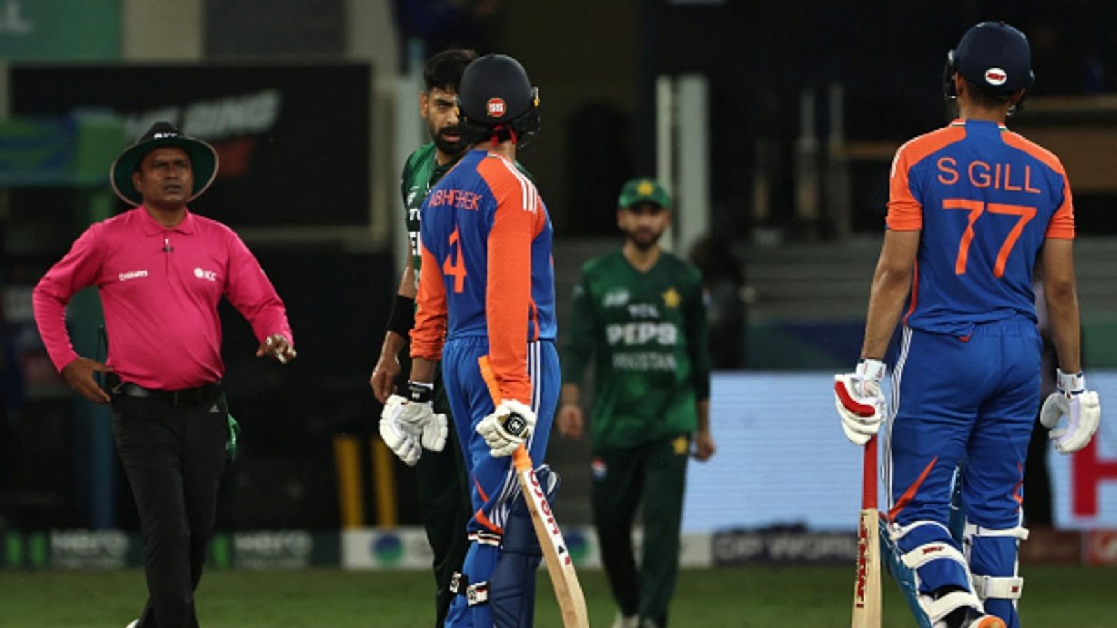 Openers Abhishek Sharma, Shubman Gill's 4-word posts responding to Pakistan bowlers' abusive sledges in Asia Cup clash go viral Pakistan's Haris Rauf (2L) tries to sledge India's Abhishek Sharma as Shubman Gill intervenes during the Asia Cup 2025 Super Four match at the Dubai International Stadium on September 21, 2025.